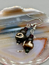 Load image into Gallery viewer, Mismatched round bone beads create an adaptable look when paired with neutral colors and wavy patterns, enabling wearers to tailor their ensembles in whatever way they desire. Measurements: 1 1/2 ” in length