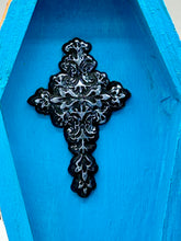 Load image into Gallery viewer, Coffin keepsake box represents the eternal love for a special kitty cat in your life. Cat silhouette sitting admiring the moon and stars. Day Of The Dead art was created for the cat lovers who adore their sweet kitty. Coffin-shaped box features a bright and vibrant orange exterior, with an adoring blue crescent moon and yellow star. Complemented with a shimmery blue ribbon and smiling moon, the inside is painted in a bright blue hue with black floral cross and detailing a traditional Mexican-themed fabric.