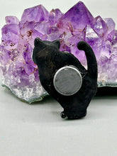 Load image into Gallery viewer, This hand-crafted art magnet featuring a skeleton cat is the ideal home decor for cat lovers, Halloween or Day Of The Dead enthusiasts. Perfect for adorning fridges, lockers, cubicles, and toolboxes.   I wanted to create an art piece that represented the eternal love for a special kitty cat in your life. Add a little touch of Mexican art to your home or office. This Day Of The Dead art was created for the cat lovers who adore their sweet kitty. H 2” x W 1/2” x D 3/8”