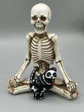 Load image into Gallery viewer, This hand-crafted art magnet featuring a skeleton cat is the ideal home decor for cat lovers, Halloween or Day Of The Dead enthusiasts. Perfect for adorning fridges, lockers, cubicles, and toolboxes.   I wanted to create an art piece that represented the eternal love for a special kitty cat in your life. Add a little touch of Mexican art to your home or office. This Day Of The Dead art was created for the cat lovers who adore their sweet kitty. H 2” x W 1/2” x D 3/8”