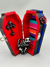 Load image into Gallery viewer, This hand-crafted art magnet featuring a skeleton cat is the ideal home decor for cat lovers, Halloween or Day Of The Dead enthusiasts. Perfect for adorning fridges, lockers, cubicles, and toolboxes.   I wanted to create an art piece that represented the eternal love for a special kitty cat in your life. Add a little touch of Mexican art to your home or office. This Day Of The Dead art was created for the cat lovers who adore their sweet kitty. H 2” x W 1/2” x D 3/8”