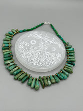 Load image into Gallery viewer, This striking Extra Large Turquoise Stone Beaded Necklace With Brass Finish Metal Beads instantly adds a touch of luxury to any outfit. Beautifully crafted with an alluring blend of extra large turquoise stone beads and brass finish metal beads, this distinctive necklace invokes an elegant cascade of vibrant color.    Measurements:    Necklace is 21 1/2 " in length adjustable to 23"