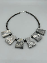 Load image into Gallery viewer, This rustic necklace features an eye-catching large trapezoid-shaped Picasso jasper and black agate combo set in a unique and chic design. Handcrafted from genuine stones, this necklace is perfect for any bohemian look. Measurements: Necklace is 19 1/2"