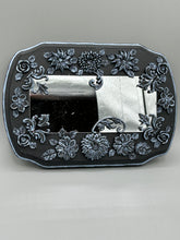 Load image into Gallery viewer, Make a bold statement with this handcrafted Goth Floral Decorative Mirror Wall Art Decor. The wood frame is complimented with highly detailed flowers, leaf and vine motifs, enhanced with shimmery metallic highlights for added texture and depth. Each intricate detail is carefully sculpted to create a unique and beautiful piece that's sure to make a statement. H 6 3/4" x W 9 1/2” x D 1"