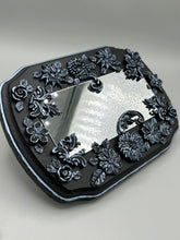 Load image into Gallery viewer, Make a bold statement with this handcrafted Goth Floral Decorative Mirror Wall Art Decor. The wood frame is complimented with highly detailed flowers, leaf and vine motifs, enhanced with shimmery metallic highlights for added texture and depth. Each intricate detail is carefully sculpted to create a unique and beautiful piece that's sure to make a statement. H 6 3/4" x W 9 1/2” x D 1"