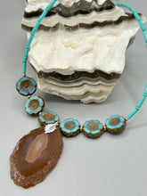 Load image into Gallery viewer, This exquisite Natural Dark Brown Agate Geode Sliced Stone Chip Necklace adds a unique touch of luxury to any look. Its banded geode and hibiscus flower glass beads offer a sophisticated bohemian style, and the natural gemstones are sure to make a statement. Add it to any outfit for a stylish and timeless touch. Measurements: Necklace is 18” in length - pendant is 1 3/4” Height Amber Stone Chip Earrings: 2" in length