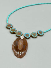Load image into Gallery viewer, This exquisite Natural Dark Brown Agate Geode Sliced Stone Chip Necklace adds a unique touch of luxury to any look. Its banded geode and hibiscus flower glass beads offer a sophisticated bohemian style, and the natural gemstones are sure to make a statement. Add it to any outfit for a stylish and timeless touch. Measurements: Necklace is 18” in length - pendant is 1 3/4” Height Amber Stone Chip Earrings: 2" in length