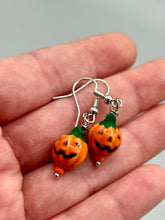 Load image into Gallery viewer, These super tiny and cute Peruvian Ceramic Jack-o-Lantern pumpkin halloween bead earrings are just perfect for fall and halloween. If halloween is not a season, rather a lifestyle, then these are perfect for every day outfits! Measurements: 7/8” in length, pumpkin beads 11mm