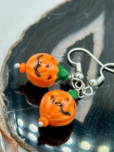 Load image into Gallery viewer, These super tiny and cute Peruvian Ceramic Jack-o-Lantern pumpkin halloween bead earrings are just perfect for fall and halloween. If halloween is not a season, rather a lifestyle, then these are perfect for every day outfits! Measurements: 7/8” in length, pumpkin beads 11mm