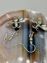 Load image into Gallery viewer, Honey bee shaped metal fish hook earrings with black and yellow glass beads. Measurement: 1" in length