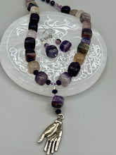 Load image into Gallery viewer, This luxurious set of earrings feature large square-shaped rainbow fluorite beads contrasted against round amethyst beads, presenting an elegant neutral yet cool-toned look. With its unique and versatile style, these earrings make a perfect addition to any wardrobe. Measurements: 1 3/8” in length