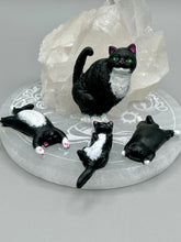Load image into Gallery viewer, Cat lovers dream, this hand-crafted black tuxedo cat magnet art is the purrfect decoration on refrigerators, lockers, cubicles or toolboxes. The set includes three mini cat figurines, featuring emerald green eyes.