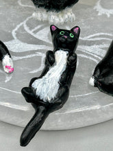 Load image into Gallery viewer, Cat lovers dream, this hand-crafted black tuxedo cat magnet art is the purrfect decoration on refrigerators, lockers, cubicles or toolboxes. The set includes three mini cat figurines, featuring emerald green eyes.