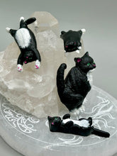 Load image into Gallery viewer, Cat lovers dream, this hand-crafted black tuxedo cat magnet art is the purrfect decoration on refrigerators, lockers, cubicles or toolboxes. The set includes three mini cat figurines, featuring emerald green eyes.