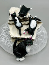 Load image into Gallery viewer, Cat lovers dream, this hand-crafted black tuxedo cat magnet art is the purrfect decoration on refrigerators, lockers, cubicles or toolboxes. The set includes three mini cat figurines, featuring emerald green eyes.