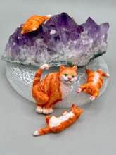 Load image into Gallery viewer, Cat lovers dream, this hand-crafted orange tabby cat magnet art is the purrfect decoration on refrigerators, lockers, cubicles or toolboxes. The set includes three mini cat figurines, featuring emerald green eyes. Measurements: H 2” x W 1/2” x D 3/8” - Cat Magnet H 2” x W 3/8” x D 3/8” - Cat Figurines