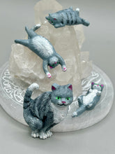 Load image into Gallery viewer, Cat lovers dream, this hand-crafted gray tabby cat magnet art is the purrfect decoration on refrigerators, lockers, cubicles or toolboxes. The set includes three mini cat figurines, featuring emerald green eyes. Measurements: H 2” x W 1/2” x D 3/8” - Cat Magnet H 2” x W 3/8” x D 3/8” - Cat Figurines
