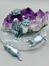 Load image into Gallery viewer, Cat lovers dream, this hand-crafted gray tabby cat magnet art is the purrfect decoration on refrigerators, lockers, cubicles or toolboxes. The set includes three mini cat figurines, featuring emerald green eyes. Measurements: H 2” x W 1/2” x D 3/8” - Cat Magnet H 2” x W 3/8” x D 3/8” - Cat Figurines