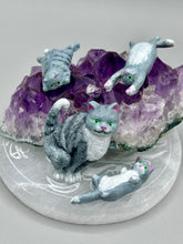 Load image into Gallery viewer, Cat lovers dream, this hand-crafted gray tabby cat magnet art is the purrfect decoration on refrigerators, lockers, cubicles or toolboxes. The set includes three mini cat figurines, featuring emerald green eyes. Measurements: H 2” x W 1/2” x D 3/8” - Cat Magnet H 2” x W 3/8” x D 3/8” - Cat Figurines