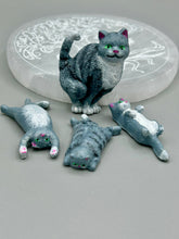 Load image into Gallery viewer, Cat lovers dream, this hand-crafted gray tabby cat magnet art is the purrfect decoration on refrigerators, lockers, cubicles or toolboxes. The set includes three mini cat figurines, featuring emerald green eyes. Measurements: H 2” x W 1/2” x D 3/8” - Cat Magnet H 2” x W 3/8” x D 3/8” - Cat Figurines
