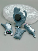 Load image into Gallery viewer, Cat lovers dream, this hand-crafted gray tabby cat magnet art is the purrfect decoration on refrigerators, lockers, cubicles or toolboxes. The set includes three mini cat figurines, featuring emerald green eyes. Measurements: H 2” x W 1/2” x D 3/8” - Cat Magnet H 2” x W 3/8” x D 3/8” - Cat Figurines