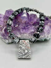 Load image into Gallery viewer, This rustic necklace features an eye-catching large trapezoid-shaped Picasso jasper, hematite, square-shaped snowflake obsidian combo set in a unique and chic design. Handcrafted from genuine stones, this necklace is perfect for any bohemian look. Measurements: Necklace is 21"
