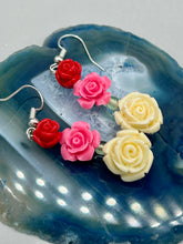 Load image into Gallery viewer, Crafted from quartzite, these highly detailed rose beads come in three striking shades of red, soft pink, and white beaded earrings. This is the ideal accessory for those interested in Dia De Los Muertos as well as those with an appreciation for gardens. Whether dressing up or down, these earrings will lend a distinctive touch to your fashion. Measurements: 1 1/2” in length