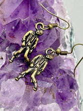 Load image into Gallery viewer, The Halloween-inspired Zombie Charm Antique Brass Earrings are crafted from Tierracast lead-free pewter and are the perfect complement to any look. Boasting fun spooky charms, these living dead earrings are a great way to celebrate the spooky season all year round. Measurements: 1 ” in length