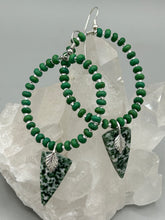 Load image into Gallery viewer, Green-White Qinghai Green Jasper Stone Beaded Hoop Earrings provide a nature-inspired look that is perfect for any boho-chic style. These earrings feature natural green jasper stone triangle pendant with small beads of silver and dark apple green magnesite stone for subtle accent. Show off your bohemian look with these eye-catching hoops. Measurements: 3" length