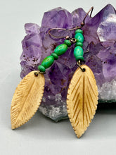 Load image into Gallery viewer, Single-stranded earring features bone carved leaf charm earrings with bright green magnesite stone beads. Antique Copper Plated Surgical Steel Hammered Long Ear-wire French Hook Earrings. Measurements: 3” in length