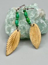 Load image into Gallery viewer, Single-stranded earring features bone carved leaf charm earrings with bright green magnesite stone beads. Antique Copper Plated Surgical Steel Hammered Long Ear-wire French Hook Earrings. Measurements: 3” in length