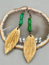 Load image into Gallery viewer, Single-stranded earring features bone carved leaf charm earrings with bright green magnesite stone beads. Antique Copper Plated Surgical Steel Hammered Long Ear-wire French Hook Earrings. Measurements: 3” in length