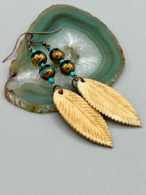 Load image into Gallery viewer, Single-stranded earring features bone carved leaf charm earrings with aqua and copper faceted glass round glass beads. Antique Copper Plated Surgical Steel Hammered Long Ear-wire French Hook Earrings.   Measurements: 3” in length