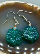 Load image into Gallery viewer, Upgrade your style with these sophisticated blue-green floral pressed glass earrings. Their iridescent glimmer finish adds a glamorous touch for any occasion. Crafted from lightweight glass, each design is both eye-catching and comfortable to wear.  Measurements: 1 1/4" length