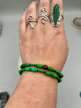 Load image into Gallery viewer, Nature inspired double-strand tigers eye and bright green magnesite stone beaded bracelet. Crafted with metal wire and fastened with a lobster claw clasp. Measurements: Bracelet: 7 3/4" in length