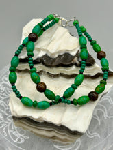 Load image into Gallery viewer, Nature inspired double-strand tigers eye and bright green magnesite stone beaded bracelet. Crafted with metal wire and fastened with a lobster claw clasp. Measurements: Bracelet: 7 3/4" in length