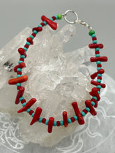 Load image into Gallery viewer, This distinctive Southwestern Style bracelet boasts a captivating combination of large red coral and blue-green turquoise glass beads for a visual impact. Crafted with metal wire and fastened with a lobster claw clasp, this bracelet is sure to command attention. Measurements: Bracelet: 8" in length