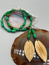 Load image into Gallery viewer, Single-stranded earring features bone carved leaf charm earrings with bright green magnesite stone beads. Antique Copper Plated Surgical Steel Hammered Long Ear-wire French Hook Earrings. Measurements: 3” in length