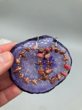 Load image into Gallery viewer, These Rhodonite Stone Chip Beaded Hoop Earrings feature natural rhodonite stones and light purple and gold glass beads for a shabby chic, boho chic, and nature-inspired bohemian look. Measurements: 1" length