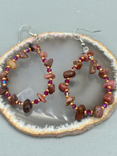 Load image into Gallery viewer, These pure rhodonite stone chip earrings with lustrous fuchsia and gold glass beading boast shimmering accents of blue, gold, and purple. Measurements: 2 1/4" length