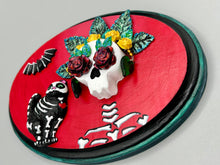 Load image into Gallery viewer, La Catrina y Gatita wall art is the purrfect hanging Day of the Dead art piece to add to your ofrenda. A tribute to an unbreakable bond and eternal love between cats and their guardians. Featuring a vibrant and intricate detail catrina and her floral crown and her kitty cat companion, this Day of the Dead-inspired artwork adds a little touch of Mexican art to your home or office. A unique handcrafted gift for any cat lover.