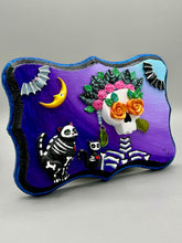 Load image into Gallery viewer, Frida Kahlo Inspired Wall Art | Dia De Los Muertos Home Decor. La Catrina y Gatita wall art is the purrfect hanging Day of the Dead art piece to add to your ofrenda. A tribute to an unbreakable bond and eternal love between cats and their guardians. Featuring a vibrant and intricate detail catrina and her floral crown and her kitty cat companion, this Day of the Dead-inspired artwork adds a little touch of Mexican art to your home or office. A unique handcrafted gift for any cat lover.