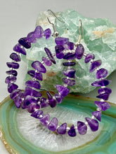 Load image into Gallery viewer, These lightweight Natural Amethyst Stone Chip Beaded Hoop Earrings are perfect for any boho chic look. The combination of cool color design makes them the perfect accessory for any winter or evening outfit. The silver glass beads add a subtle sparkle to complete the hippie vibe. Measurements: 2" length