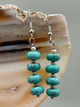 Load image into Gallery viewer, These earrings feature a single strand constructed with quartzite turquoise stone and silver glass beaded earrings. A pair of unique, nature-inspired look. Measurements: 1 1/4" length