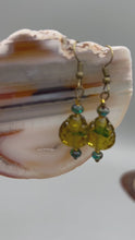 Load and play video in Gallery viewer, Dark Amber And Green Tone Pressed Glass Leaf Charm Beaded Earrings, Hippie Vibe, Nature Inspired