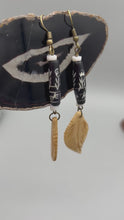 Load and play video in Gallery viewer, Bone Carved Leaf Charm Earrings, Black And White Bone Carved Beaded Earrings