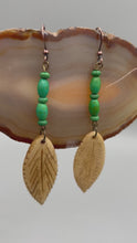 Load and play video in Gallery viewer, Bone Carved Leaf Charm Earrings, Bright Green Magnesite Stone Beaded Earrings