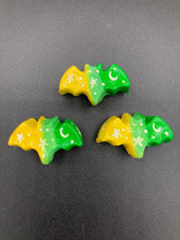Load image into Gallery viewer, Cute and spooky magnet design to adorn your refrigerator, lockers, workstation, toolbox, or dishwasher. This hand-sculpted clay bat statuette boasts stunning ombre coloration, transitioning from to dark green to light green and then to bright yellow to recreate the breathtaking look of a starry night sky. H 1” x W 2” x D 1/2”