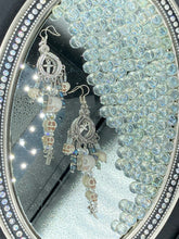 Load image into Gallery viewer, Day of The Dead, La Catrina Dia De Los Muertos Aretes, Pastel Goth Jewelry, Dangling Skulls Silver Cross Beaded Chandelier Style Earrings