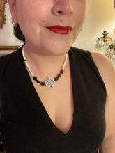 Load image into Gallery viewer, This impressive 24mm reconstituted quartzite lentil bead creates an eye-catching statement piece. The black and white glass beads add a sophisticated touch to its understated tree print. Perfectly suited to casual and formal occasions alike, this stunning necklace will complete any look. It was inspired by the stunning landscapes found in the U.S. National Arboretum in D.C. Measurements: Necklace is 17 " in length